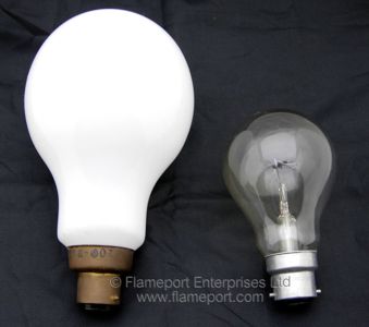 Large photo lamp next to a standard 60W bulb