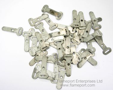 Pile of metal buckle clips for securing cables to a wall