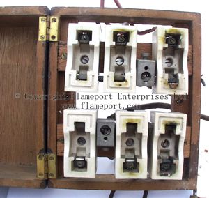 Wooden fusebox with fuses removed