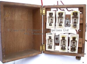 Wooden MEM fusebox with fuses removed