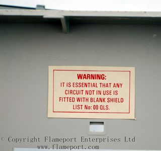Warning label inside a MEMERA 3 fuse box