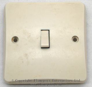 Front of an old MK single gang light switch