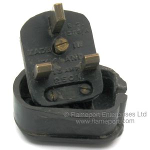 Pins and moulded text on a black rubber Hercules 13A 3 pin plug