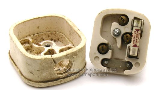 Inside a MK rubber covered white 13A plug