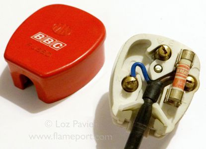 Inside an MK Toughplug with red lid and BBC logo