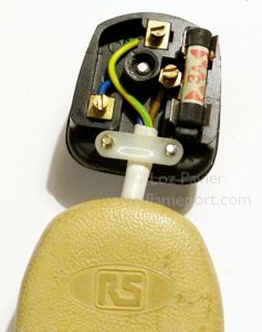 Inside a rubber BS1363 Duraplug with white lid branded RS 