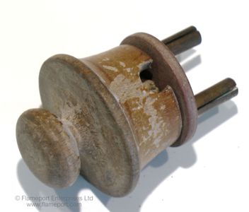 Wooden plug with side flex entry