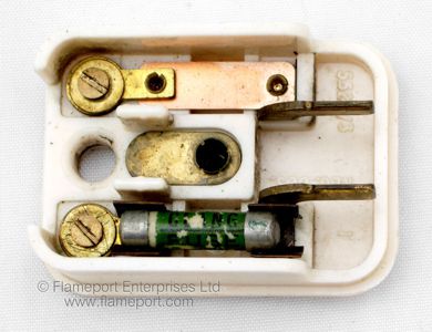 Interior view of Clang clock connector plug with fuse