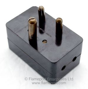 Large IRL brand electrical adaptor showing 15A plug pins