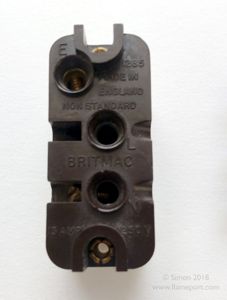 Rear of a Britmac 1285 13A non-standard socket showing wire terminals