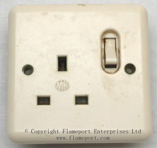 Old single switched MK socket outlet