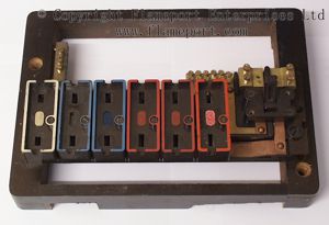 Partially assembled brown Wylex fuse box