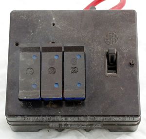 Three way brown plastic Wylex fuse box